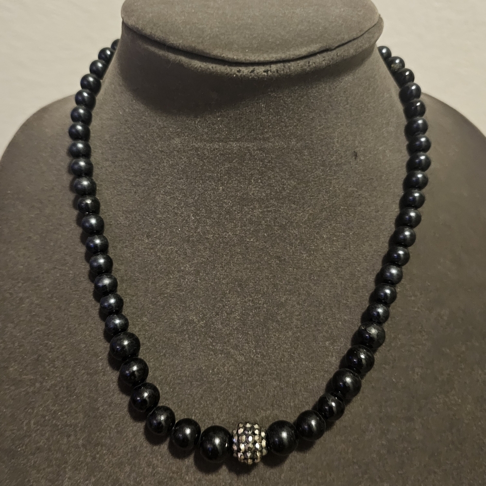 Black beaded necklace with rhinestone bead